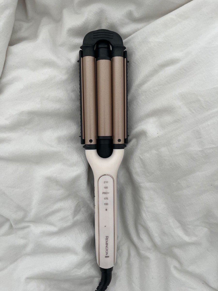 A Remington triple barrel hair waver 